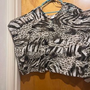 Animal print sheer top square scarf cut with seams at the sides.Nwt